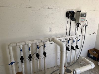 The splash pad's valve wall — each valve runs one spray feature