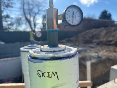 Every line gets labeled. This one's the skimmer, and it's holding pressure